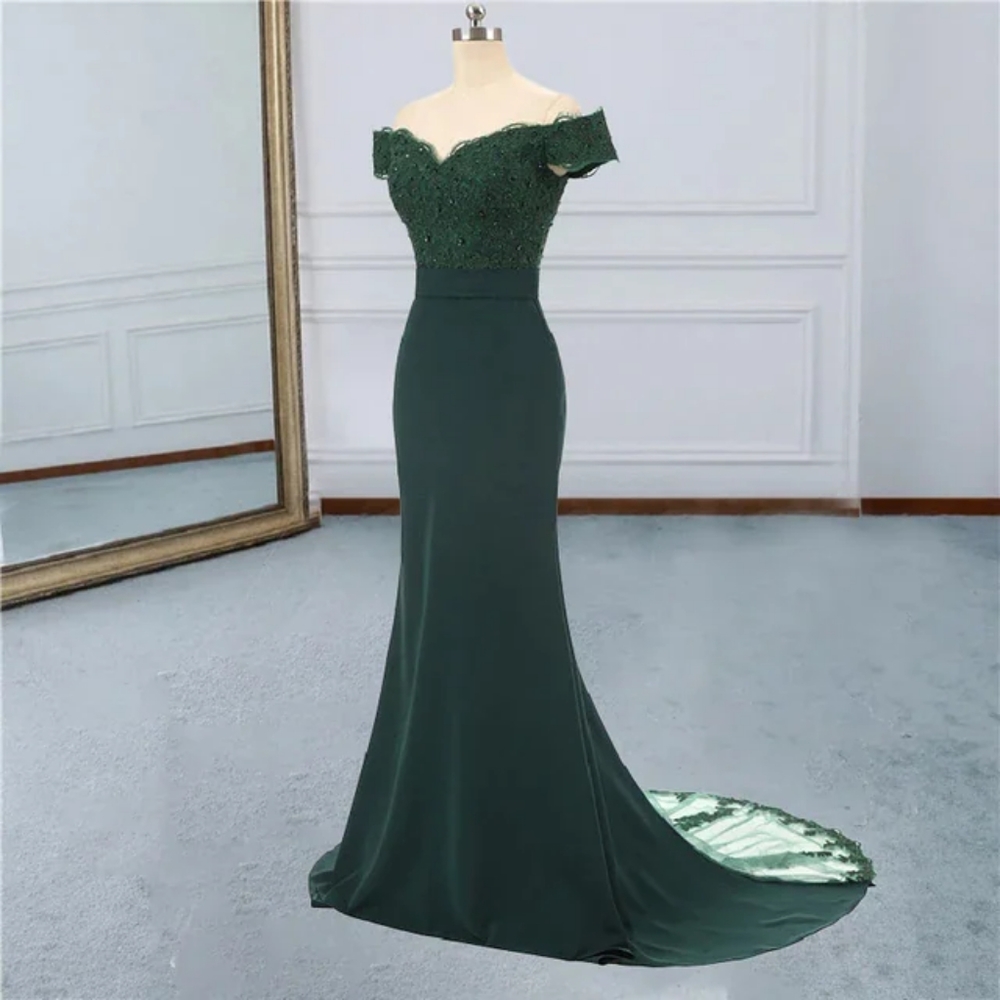 Long dark green mermaid evening dress.